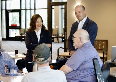 Gov. Gretchen Whitmer and Sen. Kevin Hertel speak with veterans